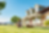 Young man playing with his dog in front of their Western Colorado home.png