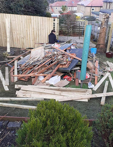 Backyard cluttered with construction debris