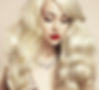 A woman with long blonde hair and striking red lipstick