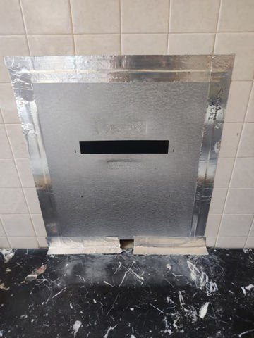 View of a bathroom after installing the bin lid