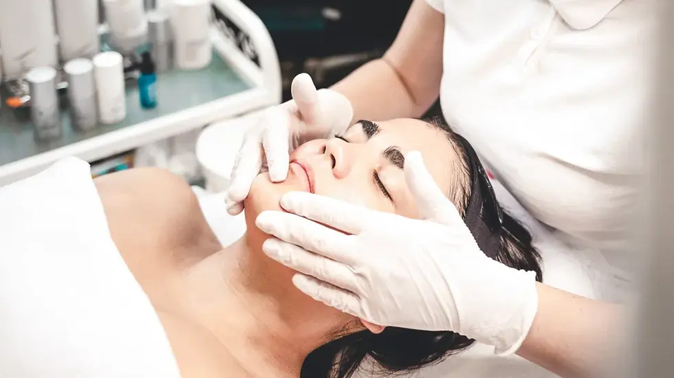 woman-having-a-facial-1296x728-header.webp