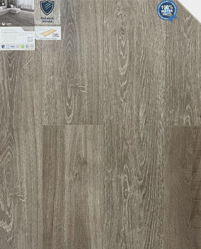 Waterproof 8.5mm SPC flooring in Yellowstone color with real-wood embossed HD texture, micro-bevel edges, and Scratch and Stain Shield finish.