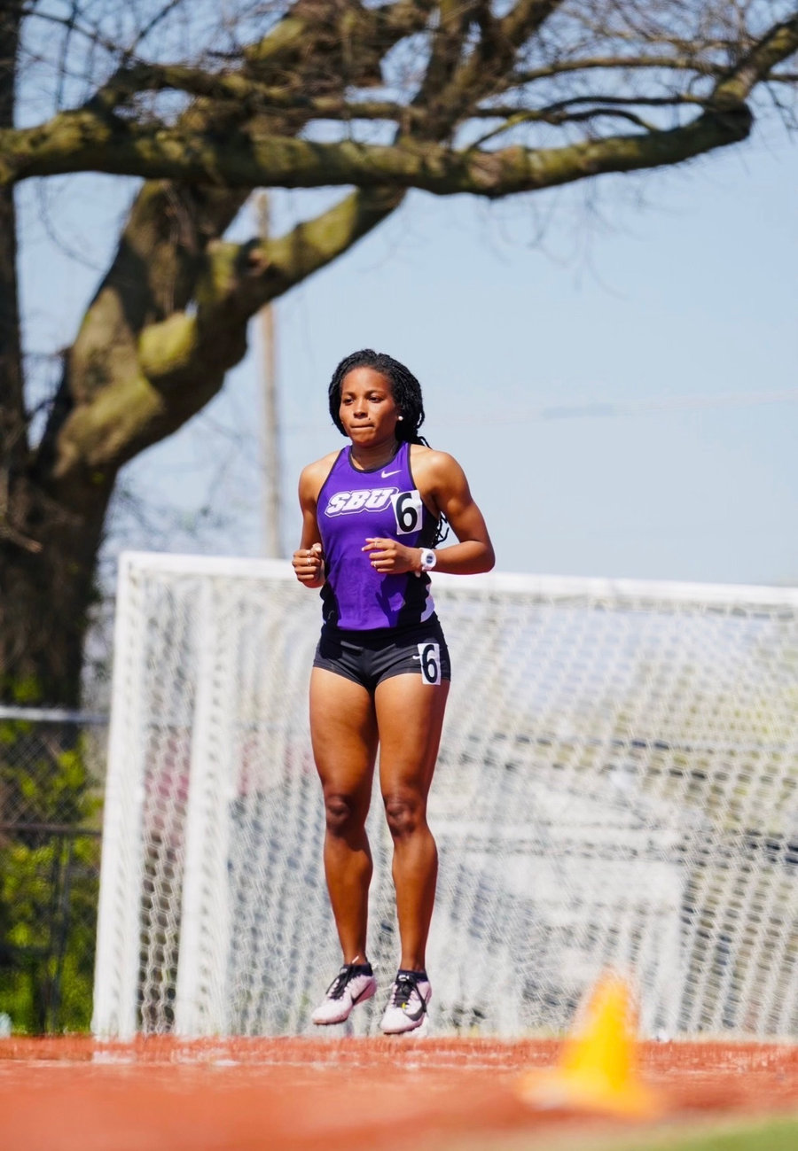Britney Clark on the track in her SBU uniform