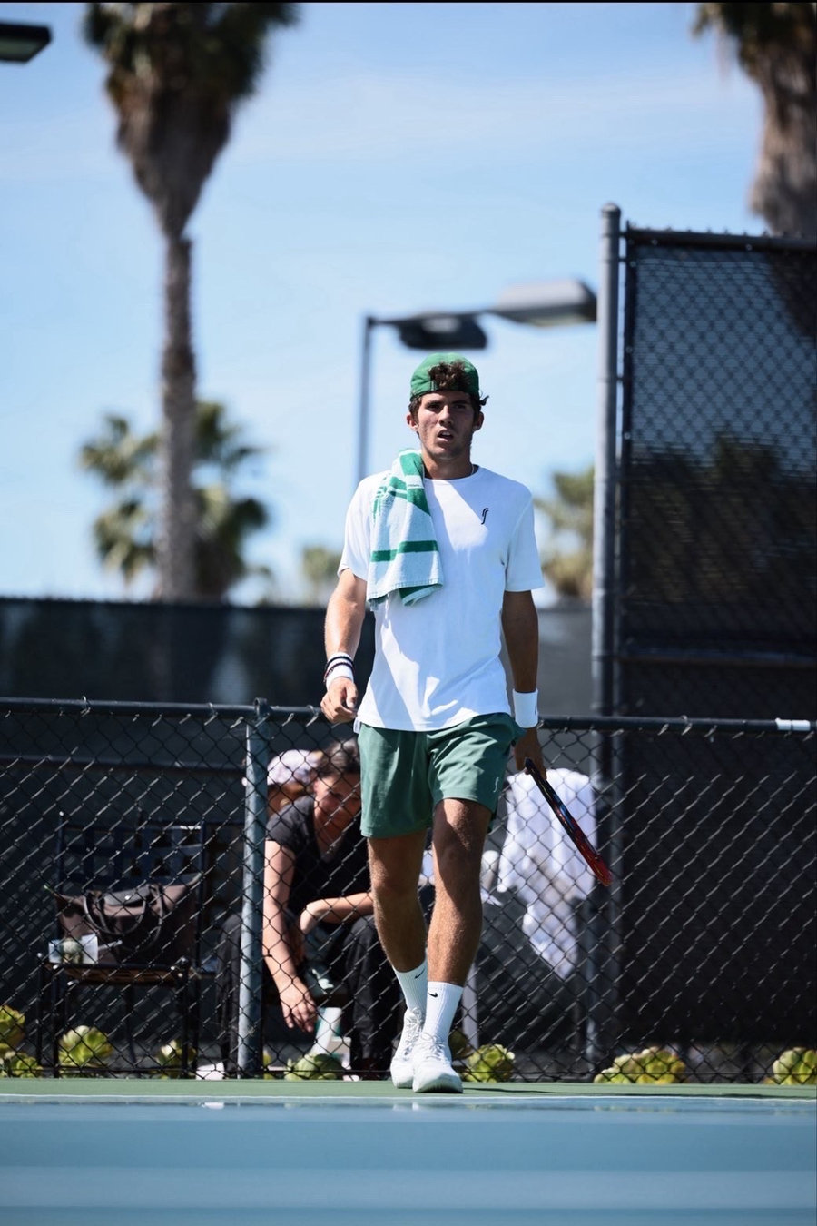 Andrej Markovic walking on court between points