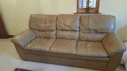 Italian soft leather sofa with lack luster cushions, leather cushions refitted, leather cushions refilled onsaite service