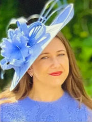 Woman wearing a light blue hatinator