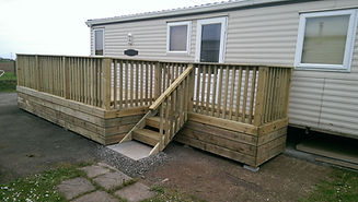 Wooden steps on a caravan deck
