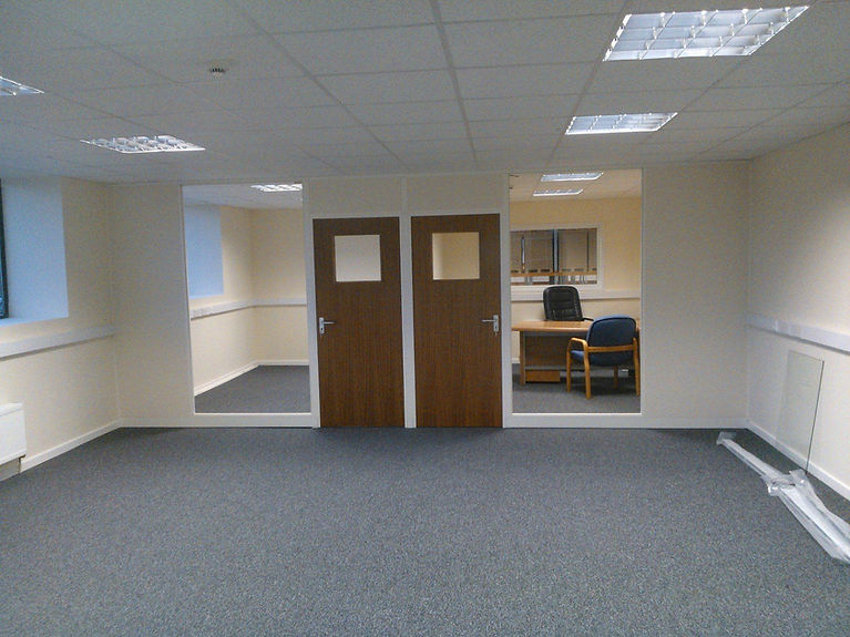 Corner office split into two with plasterboard