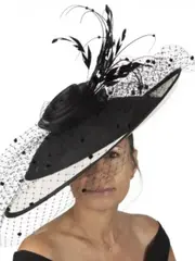 Lady modelling a black and white hat