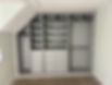 Open wardrobe fitted into an awkward space