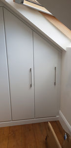 Wardrobes fitted to a very small space