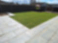 Landscaped garden with paving and lawn