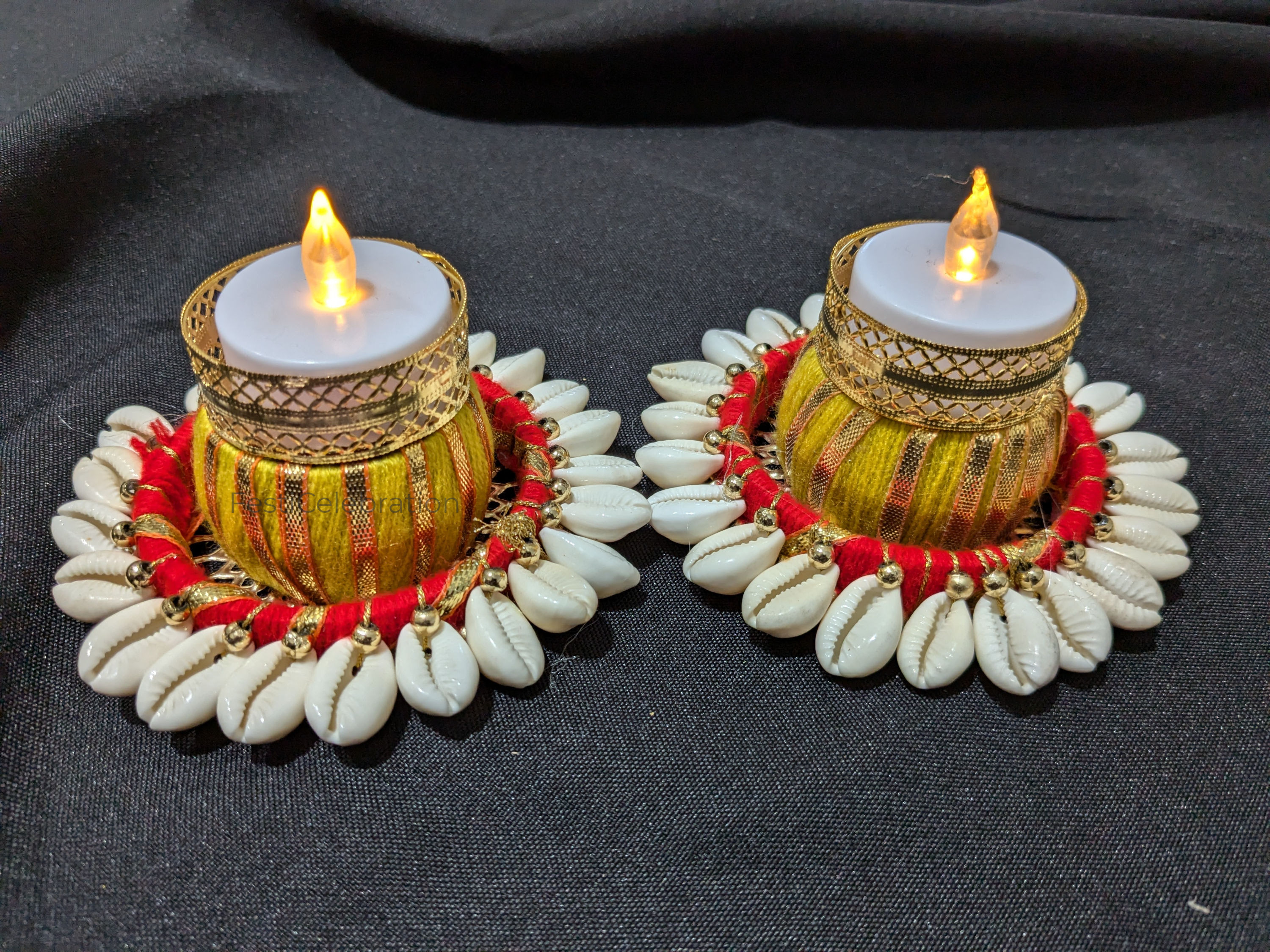 Handcrafted Cowrie Shell Decorative T-light Diya with Golden and Red Threadwork