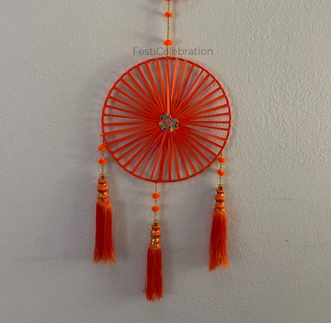 Vertical festive wall decor with pom-poms