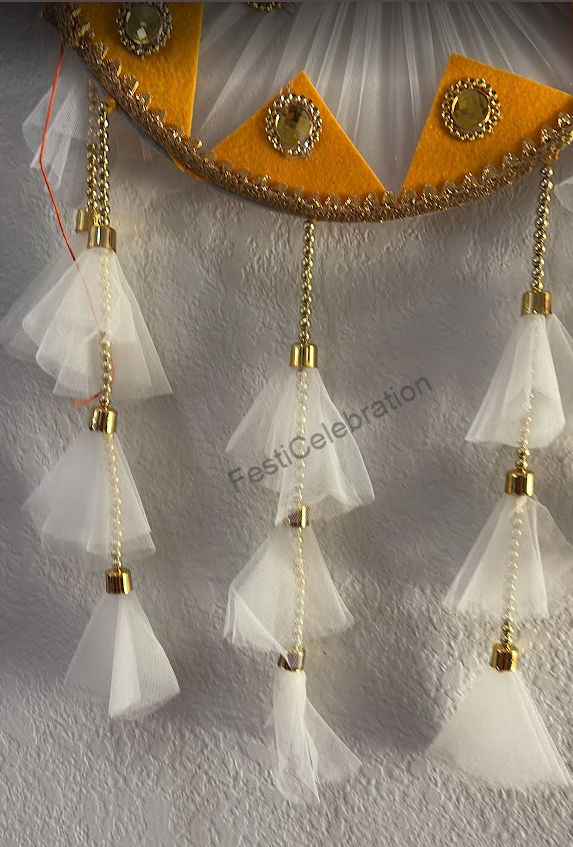 Orange and white handmade wall hanging