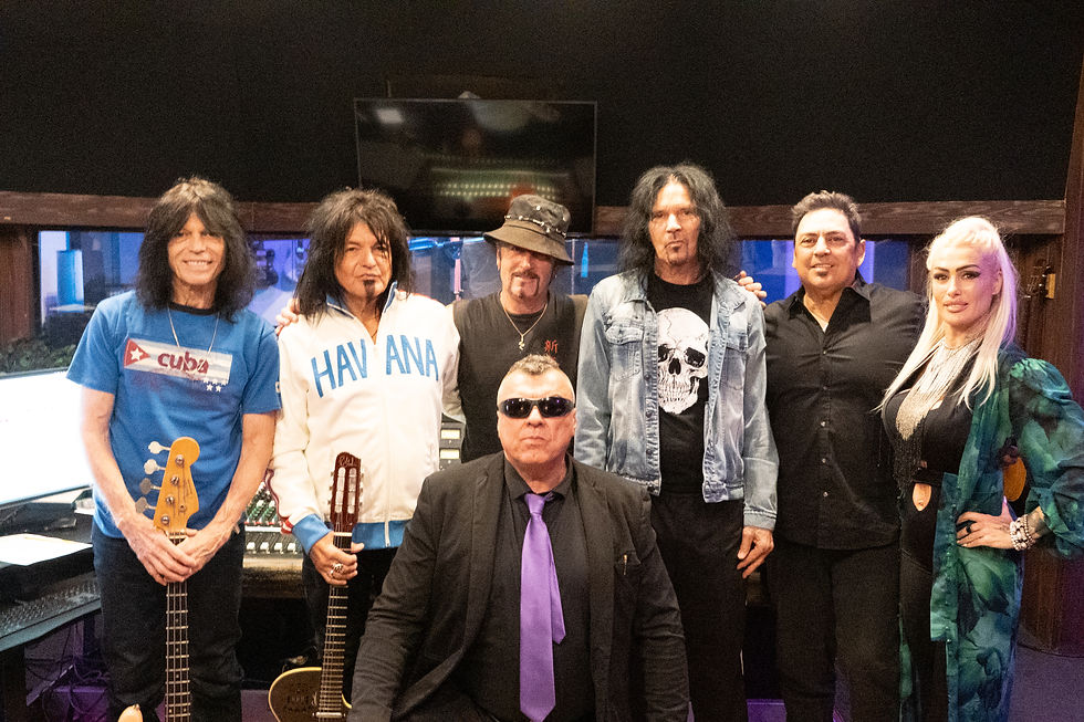 From Left: Rudy Sarzo, Robert Sarzo, Danny Saber, Jizzy Pearl, Ruben Martinez, Claudette Lyons and Gianluca Zanna