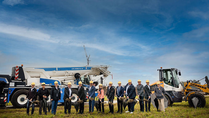 30-Second Takeaway Liebherr has begun construction on a new customer centre and dispatch facility at its Ehingen-Berg site in Germany, marking a significant investment aimed at optimizing production and logistics processes. Despite global economic challenges and increasing competition, the expansion underscores Liebherr’s long-term commitment to Germany as an industrial location, with political and economic leaders supporting the strategic development of the 54-hectare site. Representatives from Liebherr and politics at the symbolic ground-breaking ceremony at IG Ehingen-Berg, from left to right: Holger Baur (Deputy Chairman of the Works Council at Liebherr-Werk Ehingen), Klaus Nagl (Municipal Councillor for Ehingen, Die Freien), Daniel Pitzer and Christoph Kleiner (Managing Directors, Liebherr-Werk Ehingen), Heiner Scheffold (District Administrator, Alb-Donau istrict), Alexander Baumann (Lord Mayor of Ehingen), Sophie Albrecht (Member of the Administrative Board, Liebherr-International AG), Ulrich Heusel (Managing Director, Liebherr-Werk Ehingen), Manuel Hagel (Member of the Board, Liebherr-International AG), Ulrich Heusel (Managing Director, Liebherr-Werk Ehingen), Manuel Hagel (Member of the Councillor in Ehingen, CDU), Klaus Tappeser (District President of the Tübingen administrative district), Bernd Boos (Managing Director, Liebherr-Werk Ehingen) and Hubert Dangelmaier (Municipal Councillor in Ehingen, Bündnis90/Die Grünen). With today’s ground-breaking ceremony in the Ehingen-Berg industrial estate, Liebherr-Werk Ehingen GmbH is officially starting the development of a new site covering more than 500,000 square metres. This will complement the existing Liebherr-Werk Ehingen GmbH site along Münsinger Straße in Ehingen, which alone measures 1 million square metres and has been in existence since 1969. The investment marks a significant milestone in the crane manufacturer’s history and is currently the largest industrial expansion of a family-owned company in southern Germany. “The expansion of the Liebherr plant in Ehingen is also an important sign for Baden-Wurttemberg as an industrial location, especially in the current economic situation,” said Manuel Hagel, Member of the State Parliament and CDU parliamentary group leader in the Stuttgart state parliament. Klaus Tappeser, Regional Minister for the Tübingen administrative district, adds: “The aim of this expansion is to maintain the prosperity of the region. Today, we can say that this goal has been achieved. Many thanks to Liebherr for its loyalty to the location!” The site acquired in June 2025 is directly adjacent to the Liebherr service centre in Ehingen-Berg, which has been in operation since 2021. The additional space is needed to make production processes more efficient in the future. In order to meet the growing space requirements and the increasing demand for ever larger cranes, Liebherr will relocate individual process steps from the main plant to the new site. The first construction phase will begin with the start of development and ground preparation in September and will be followed by others – including the construction of a modern customer centre with an integrated dispatch wing and the return of previously rented logistics space. As part of the first expansion phase, some employees will initially move from the main plant to Ehingen-Berg. Strong commitment to the location Despite the challenging economic situation, particularly due to increasing competition from Chinese manufacturers, Liebherr is reaffirming its long-term commitment to the Ehingen site with this investment. “The expansion is good for our town and its citizens. It is more than just another joint step – it is the basis for the future, for prosperity and prosperity in the interests of the people living here, an investment with foresight in our home region,” emphasises Alexander Baumann, Lord Mayor of the town of Ehingen. District Administrator Heiner Scheffold adds: “The fact that a highly innovative, world-class family business like Liebherr is expanding right here in the Alb-Donau district is a strong sign of the attractiveness of our location and a benefit for our entire region.” With over 5,000 employees, Liebherr-Werk Ehingen GmbH is the largest employer in the Alb-Donau district. “Especially for our employees, the expansion in the immediate vicinity of the main plant in Ehingen is a sign of appreciation, also in view of the successful past years. At the same time, we are investing today in order to be prepared for the challenges ahead. Therefore, the expansion, which we will declare as LWE-Süd in future, is an absolute commitment to the site, but of course also an obligation,” explains Daniel Pitzer, Commercial Director of Liebherr-Werk Ehingen GmbH. “In line with our announcements, we are making sure that operations at the new site are as environmentally friendly as possible, which means, among other things, that fossil fuels will not be used. The vehicle fleet will be powered by electricity wherever possible and the buildings will be realised in accordance with current KfW standards,” adds Ulrich Heusel, Managing Director Production at Liebherr-Werk Ehingen GmbH. In 2024, Liebherr-Werk Ehingen delivered around 2,000 mobile and crawler cranes, with a turnover of around 3.2 billion euros. Liebherr-Werk Ehingen is part of the Liebherr Group, which achieved a turnover of over 14 billion euros in 2024 with more than 50,000 employees worldwide. About Liebherr-Werk Ehingen GmbH Liebherr-Werk Ehingen GmbH is a leading manufacturer of mobile and crawler cranes. Its range of mobile cranes extends from 2-axle 35 tonne cranes to heavy duty cranes with a lifting capacity of 1200 tonnes and a 9-axle chassis. Its lattice boom cranes on mobile or crawler travel gear deliver lifting capacities of up to 3000 tonnes. With universal boom systems and extensive additional equipment, they can be seen in action on construction sites throughout the world. The Ehingen site has a workforce of 5,000. An extensive, global service network guarantees the high availability of Liebherr mobile and crawler cranes. In 2024, the Liebherr plant in Ehingen recorded a turnover of 3.19 billion euros. About the Liebherr Group The Liebherr Group is a family-run technology company with a highly diversified product programme. The company is one of the largest construction equipment manufacturers in the world. It also provides high-quality, user-oriented products and services in a wide range of other areas. The Liebherr Group includes over 150 companies across all continents. In 2024, it employed more than 50,000 staff and achieved combined revenues of over 14 billion euros. Liebherr was founded by Hans Liebherr in 1949 in the southern German town of Kirchdorf an der Iller. Since then, the employees have been pursuing the goal of achieving continuous technological innovation, and bringing industry-leading solutions to its customers. Frequently Asked Questions (FAQ) What is Liebherr building at the Ehingen-Berg industrial estate? Liebherr is developing a new site covering more than 500,000 square metres, including a modern customer centre and an integrated dispatch wing, to complement its existing Ehingen plant. Why is Liebherr expanding in Ehingen? The expansion is intended to optimize production and logistics processes, meet growing space requirements, and support the increasing demand for larger mobile and crawler cranes. How does the new site relate to Liebherr’s existing facilities? The Ehingen-Berg site is located adjacent to Liebherr’s service centre, which has been operating since 2021, and will complement the main Liebherr-Werk Ehingen GmbH plant on Münsinger Straße, in operation since 1969. When will construction begin? The first construction phase will begin with site development and ground preparation in September, followed by additional phases including building construction and logistics consolidation. Will employees be affected by the expansion? Yes. As part of the first expansion phase, some employees will relocate from the main plant to the new Ehingen-Berg site. What does the expansion mean for the region? The investment is one of the largest industrial expansions by a family-owned company in southern Germany and reinforces Ehingen and Baden-Württemberg as important industrial locations. How is Liebherr addressing sustainability at the new site? The new site will operate without fossil fuels, use electric vehicles wherever possible, and feature buildings constructed to current KfW energy-efficiency standards. How significant is Liebherr-Werk Ehingen within the Liebherr Group? Liebherr-Werk Ehingen employs over 5,000 people, delivered around 2,000 mobile and crawler cranes in 2024, and generated approximately €3.2 billion in turnover. How does this expansion fit into Liebherr’s long-term strategy? The project reflects Liebherr’s long-term commitment to the Ehingen location, its workforce, and its ability to remain competitive in the global crane market despite increasing international competition.