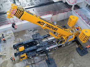 With a single lift, the LTM 1400-6.1 places the Y-guying system on its undercarriage and can then attach it fully automatically to the telescopic boom by luffing it down using the Solidlink quick coupling.