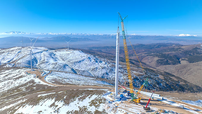 30-Second Takeaway Hareket delivered a fully integrated transportation and installation solution for the Şule Wind Energy Project in Turkey, overcoming extreme altitude, sub-zero temperatures, and complex terrain. By coordinating heavy transport logistics with high-capacity lifting operations, the team safely moved and installed some of the largest wind turbine components in the country completing each turbine installation in as little as 2.5 days with a zero-error approach. As part of the Şule Wind Energy Project in Turkey, Hareket successfully carried out the transportation and installation of wind turbines. This project, executed at an altitude of 2,400 meters, in -25°C cold, and under challenging terrain conditions, was completed with a seamless operation from transportation to installation. During this major operation, we safely transported 11 sets of blades, each measuring 81 meters in length and weighing 84 tons, from Gemlik Port to the wind power plant in Isparta’s Şarkikaraağaç district along a 454-kilometer route. To ensure a smooth transit, we carefully planned and executed special bypass operations at bridges, intersections, and narrow passages along the way. Integrated Solutions from Hareket A Seamless Operation from Transportation to InstallationDue to the blade length and generator tonnage, we successfully executed the heavy lifting and installation of one of the largest wind turbine models installed in Turkey. Thanks to the full coordination of our transportation, crane, and installation teams, each turbine installation was completed in as little as 2.5 days. To ensure a safe and efficient operation, we deployed a fleet of high-capacity cranes, each carefully selected to meet the project’s unique challenges. A 650-ton crawler crane provided the main lifting capacity, while a 250-ton telescopic boom crawler crane enhanced flexibility and reach. Additionally, a 250-ton mobile crane, a 200-ton mobile crane, and a 130-ton mobile crane were utilized for precise positioning and support throughout the installation process. The top priority in this project was to execute every step with a zero-error approach, complete synchronization, and strong teamwork. Despite extreme weather conditions, our teams & dedicated efforts ensured the installation process was completed smoothly. About Hareket Hareket is a leading provider of engineered heavy lifting, heavy transport, and project logistics solutions, with more than 60 years of experience delivering complex operations across energy, infrastructure, and industrial markets. Founded in Turkey and headquartered in Istanbul, Hareket has built a strong reputation for executing technically demanding projects where precision, safety, and coordination are critical. The company’s service offering extends well beyond crane and transport operations and includes comprehensive project planning, route and feasibility studies, lift engineering, method statements, project management, and on-site installation works. This integrated approach allows Hareket to support projects from early planning stages through final execution, even in highly constrained or remote environments. Hareket has a well-established track record across Turkey, the Caspian region, Eurasia, the Middle East, and Africa, serving clients in the petrochemical, oil & gas, renewable energy, power generation, and heavy industrial sectors. Its expertise spans greenfield developments, shutdowns and turnarounds, maintenance projects, and offshore operations, including wind, refinery, and large-scale energy infrastructure projects. Supported by a modern fleet of heavy-lift cranes, SPMTs, modular trailers, and specialized transport equipment, along with highly experienced engineering and operations teams, Hareket is recognized as a trusted partner for some of the region’s most complex lifting and transportation challenges. The company continues to play a key role in supporting energy transition and infrastructure development through safe, efficient, and engineered heavy lift solutions. Learn More: https://www.hareket.com/en/home-page Frequently Asked Questions What was the Şule Wind Energy Project? The Şule Wind Energy Project involved the transportation and installation of large wind turbine components at a high-altitude site in Turkey’s Isparta Şarkikaraağaç district. What made this project particularly challenging? The project was executed at an altitude of 2,400 meters, in temperatures as low as -25°C, across difficult terrain and along a 454-kilometer transport route. How large were the wind turbine components transported? Hareket transported 11 sets of blades, each measuring 81 meters in length and weighing 84 tons, along with heavy generators and other turbine components. How long did each turbine installation take? Thanks to integrated planning and coordination, each turbine installation was completed in as little as 2.5 days. What equipment was used for the installation? The operation utilized a 650-ton crawler crane as the primary lifting unit, supported by a 250-ton telescopic boom crawler crane, 250-ton mobile crane, 200-ton mobile crane, and 130-ton mobile crane. Why is an integrated solution important for wind energy projects? Combining transportation, lifting, and installation under a single coordinated approach reduces risk, improves efficiency, and ensures safer execution especially in extreme and remote environments. How did Hareket ensure safety and precision? Through detailed route planning, specialized bypass operations, a zero-error execution strategy, and close coordination between transportation, crane, and installation teams.