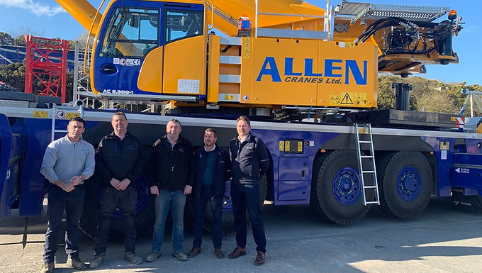 30-Second Takeaway Irish crane specialist Allen Crane Hire has taken delivery of a Tadano AC 6.300-1 , citing its outstanding price–performance ratio, compact design, and exceptional lifting capacity as key decision factors. With an 80-metre main boom as standard and a 63-metre luffing jib , the 300-tonne all-terrain crane is ideally suited for tower crane erection and dismantling the company’s core business. From left to right: Philip Conway (Operations Manager, Allen Cranes Ltd.), Alan Allen (Director, Allen Cranes Ltd.), Robbie Allen (Business Owner, Allen Cranes Ltd.), Ed Taylor (Regional Sales Manager, Tadano), Lloyd Gee-Nyland (Business Leader UK & Ireland, Tadano) Allen Crane Hire has expanded its fleet with the addition of a Tadano AC 6.300-1 , a crane that has quickly proven to be a perfect fit for the company’s operations across Ireland. “There are products that make things remarkably easy for their sellers, and the Tadano AC 6.300-1 is definitely one of those,” says Robbie Allen , Business Owner of Allen Crane Hire. “Our contact at Tadano, Ed Taylor , quickly convinced us that the AC 6.300-1 has the best price–performance ratio in its class.” The handover was completed by Ed Taylor , Tadano Regional Sales Manager, and attended by senior representatives from both companies, marking a significant addition to Allen Crane Hire’s growing fleet. Built for Tower Crane Work Allen Crane Hire’s team agrees that the AC 6.300-1 feels purpose-built for their day-to-day work. The crane’s 80-metre main boom , supplied as standard, enables the erection and dismantling of around 90% of the tower cranes currently operating in Ireland . This capability directly supports the company’s core focus on construction crane services, while the crane’s six-axle compact design and exceptional manoeuvrability make it highly effective on congested urban jobsites where space is limited. “Above all, its lifting capacity at a 50-metre radius with the full 63-metre luffing jib is simply fantastic for a 300-tonne crane,” Allen explains. “It’s more than perfect for our needs.” Performance Proven on Site The AC 6.300-1 has already demonstrated its capabilities in real-world conditions. Shortly after delivery, the crane was deployed to dismantle an 80-metre-tall, 20-tonne tower crane at a jobsite in north Dublin . The operation was completed smoothly, safely, and efficiently , reinforcing Allen Crane Hire’s confidence in both the crane’s performance and its suitability for demanding tower crane work. About Allen Mobile Cranes Ltd Allen Cranes Limited , headquartered in Tinode, Blessington, County Wicklow , is an Irish crane specialist with more than 30 years of experience in construction crane rental and sales. The company provides comprehensive services including tower crane erection and dismantling, servicing, repairs, transport, and storage , supporting projects across Ireland with a strong focus on safety and reliability. About the Tadano Group Since introducing Japan’s first hydraulic truck crane in 1955 , Tadano has grown into a global leader in lifting and access equipment. Guided by its core values of Safety, Quality, and Efficiency Based on Compliance (C+SQE) , Tadano delivers reliable, innovative solutions for the construction, energy, and industrial sectors worldwide. With a robust global support network and a strong commitment to sustainability, Tadano continues to advance lifting technology under its corporate philosophy of Creation, Contribution, and Cooperation . Learn More 🔗 https://www.tadano.com Frequently Asked Questions What makes the Tadano AC 6.300-1 stand out in the 300-tonne class? The AC 6.300-1 offers an exceptional price–performance ratio , combining a standard 80-metre main boom , high lifting capacities, and compact dimensions in a six-axle configuration. It delivers performance typically associated with larger, heavier cranes while maintaining excellent mobility and maneuverability. Why is the AC 6.300-1 particularly well suited for tower crane erection and dismantling? With its 80-metre main boom supplied as standard and the option of a 63-metre luffing jib , the AC 6.300-1 can handle the erection and dismantling of up to 90% of tower cranes commonly used in Ireland . Its strong capacities at long radii especially around 50 metres make it ideal for high-reach, precision tower crane work. Does the AC 6.300-1 require a luffing jib for most jobs? In many cases, no . The long standard main boom allows the crane to complete a wide range of jobs without a luffing jib, reducing transport requirements, setup time, and overall job costs. When additional reach or flexibility is required, the optional luffing jib provides outstanding performance at extended radii. How does the crane perform on tight or congested jobsites? Despite its 300-tonne capacity, the AC 6.300-1 features a compact six-axle design with excellent steering and maneuverability. This makes it highly effective in urban environments and confined sites , where access and setup space are limited — a key advantage for city-based tower crane projects. What lifting capacity does the AC 6.300-1 offer at longer radii? The crane delivers exceptional lifting performance at long radii , particularly when equipped with the full 63-metre luffing jib . Its capacity at a 50-metre radius is a standout feature within the 300-tonne class, enabling safe and efficient handling of heavy components at height. How quickly can the Tadano AC 6.300-1 be mobilized on site? Thanks to its efficient transport configuration and streamlined setup process , the AC 6.300-1 can be mobilized and made operational quickly. Reduced need for auxiliary equipment and fewer transport movements help minimize downtime between jobs. What types of projects is the AC 6.300-1 best suited for? The Tadano AC 6.300-1 is ideally suited for: Tower crane erection and dismantling Urban construction projects Infrastructure and commercial builds Industrial lifting operations Jobs requiring long reach with high precision Its versatility makes it a strong all-rounder for both specialist and general lifting applications. How does the AC 6.300-1 compare to larger multi-axle cranes? The AC 6.300-1 often replaces the need for larger seven- or eight-axle cranes on many jobs. Its long boom, strong load charts, and compact footprint allow it to deliver comparable performance with lower operating costs, faster setup, and improved site access .