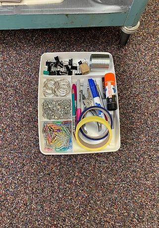 tray of paper clips, binder clips, a hole punch, etc..JPG