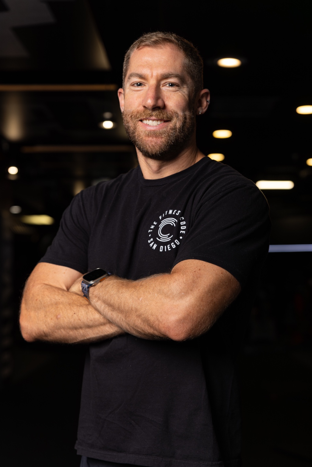 Cody Jensen smiling at his San Diego training studio