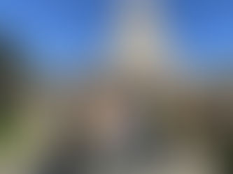 a group of nine advocates standing in front of the washington state legislative building