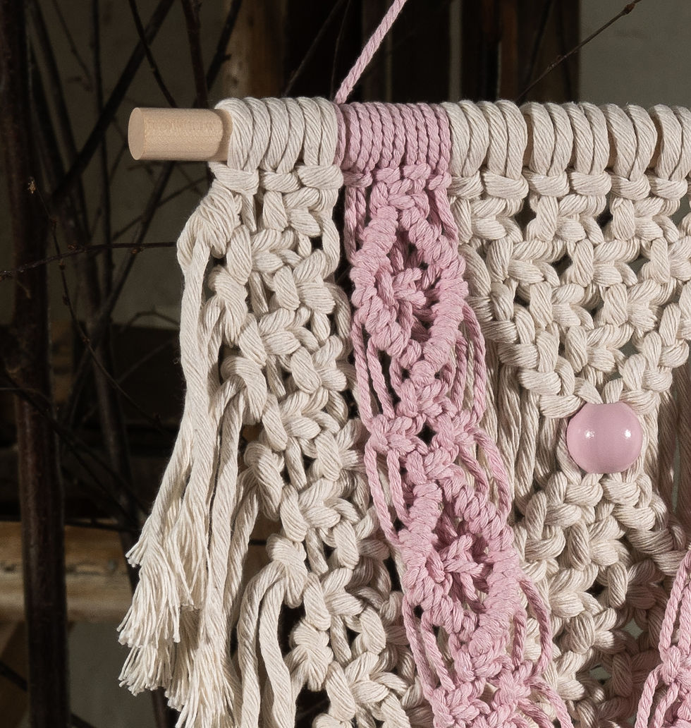 Thumbnail: The piece is suspended from a natural wood dowel.