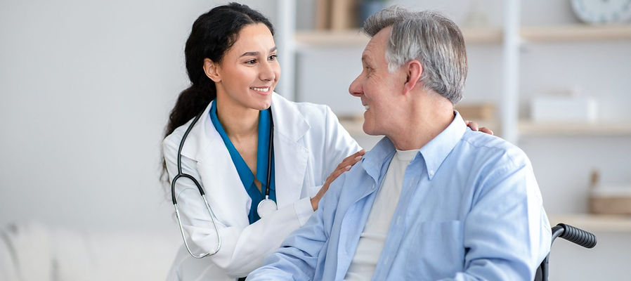 impaired-senior-man-in-wheelchair-and-young-nurse-taking-care-of-him-at-home-e163852482779