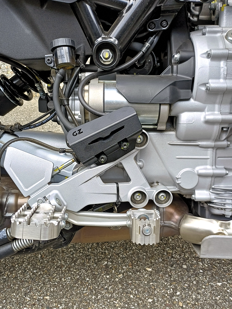 Miniatura: Protection rear brake pump V100 Stelvio/ Mandello SM6060350