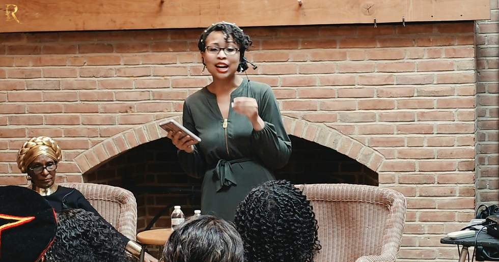 Radiance Talley performing her original poetry next to Dr. Barbara Talley at The Poets Speak's sold-out narrative theater performance.