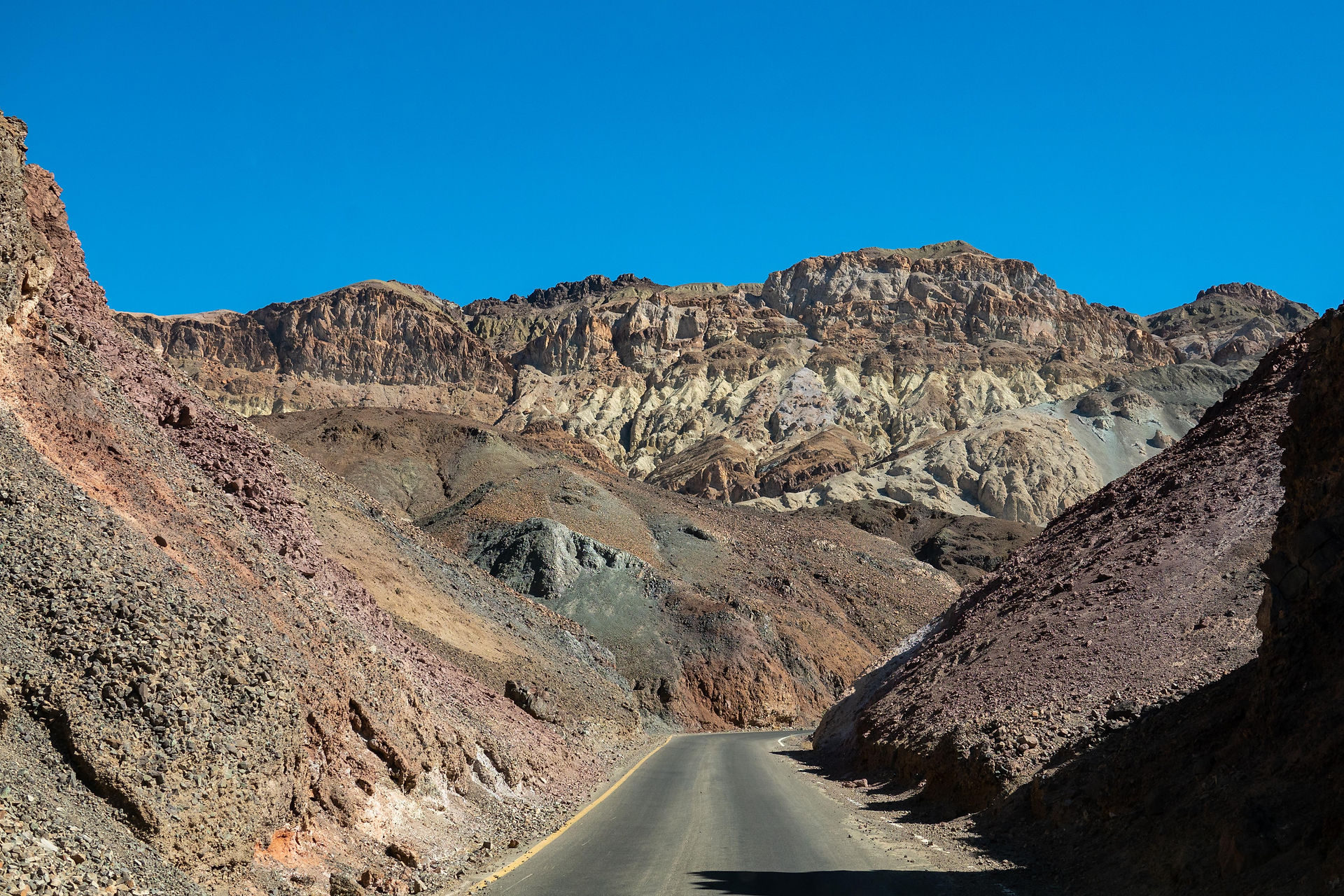Scenic photograph of the colorful hills at Artist's Drive in Death Valley National Park, California. 