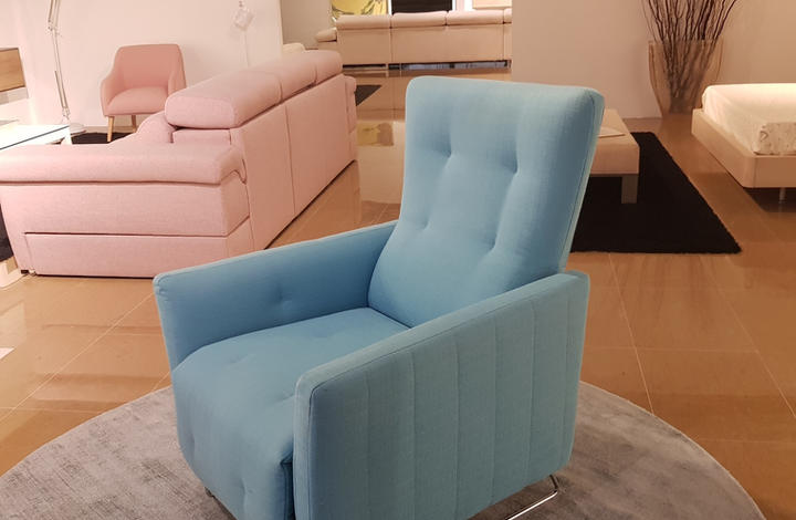 Butaca relax manual Modelo Koko de Snatt Sofás de 74X84f. Tapizado azul turquesa. ANTES 64
