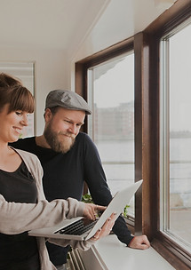business-people-using-laptop-while-stand