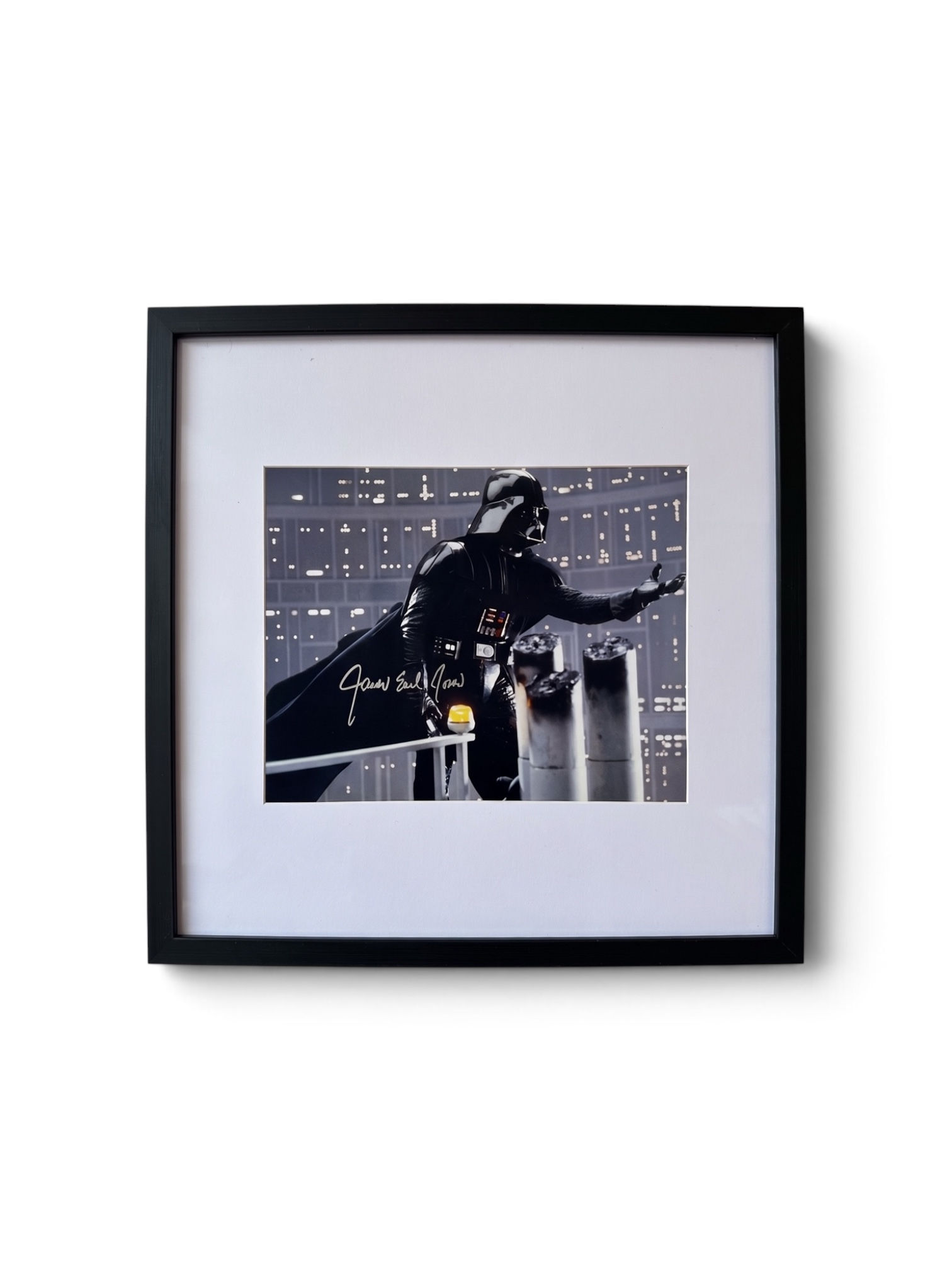 James Earl Jones signed Darth Vader photograph in a black frame with white mount
