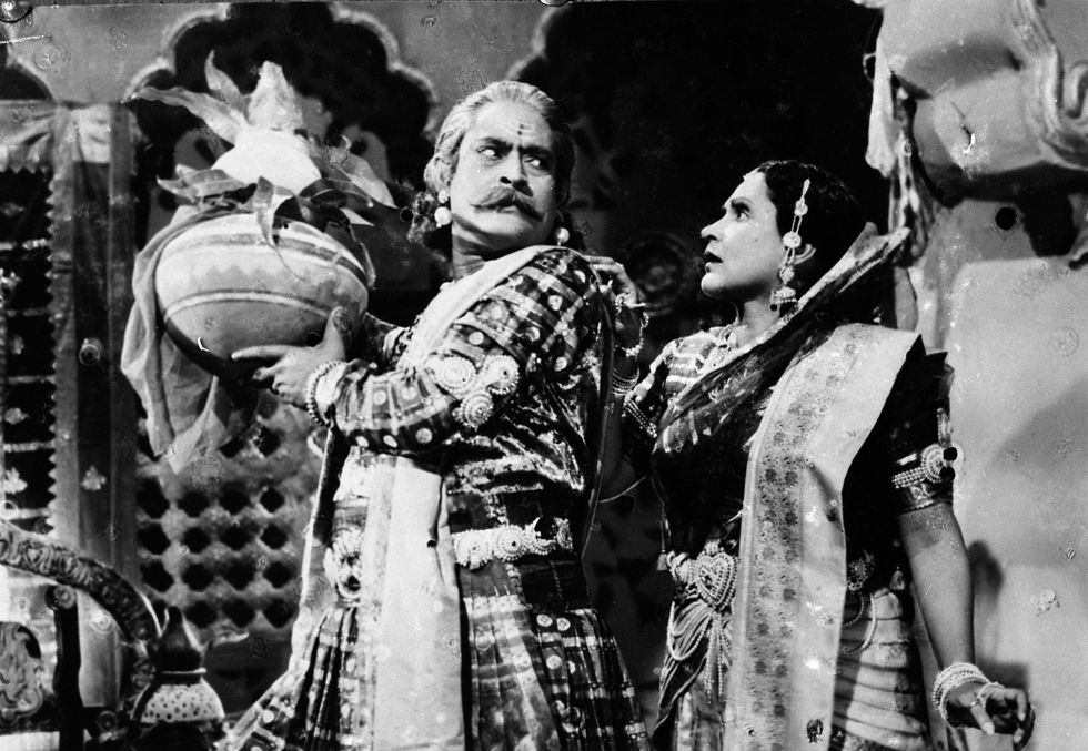 a black and white photo of a man and a woman