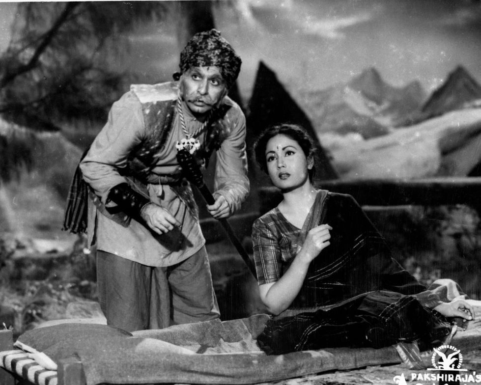 a black and white photo of a man and a woman that says paks on the bottom