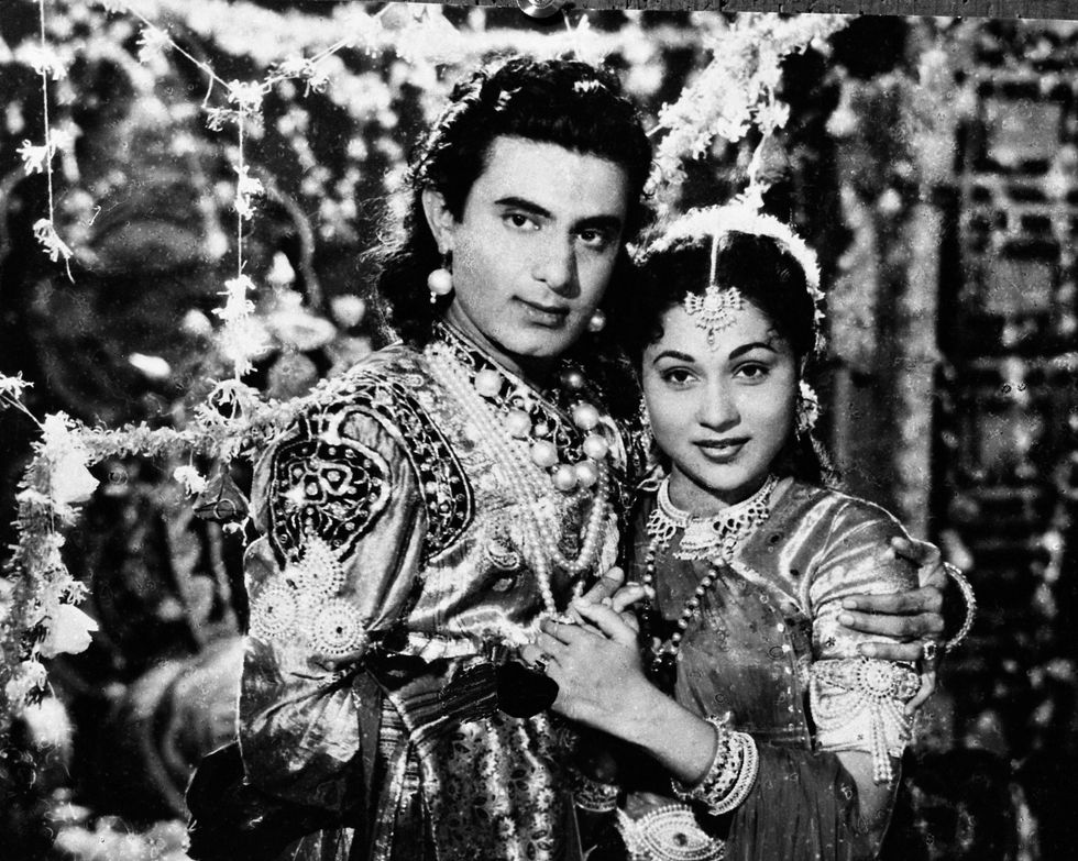 a black and white photo of a man and a woman