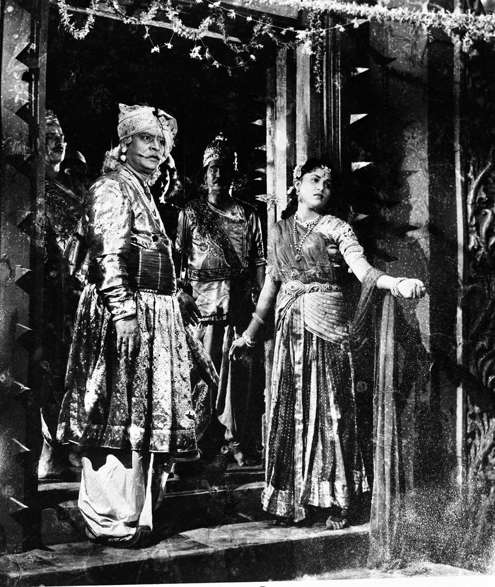 a black and white photo of a group of people