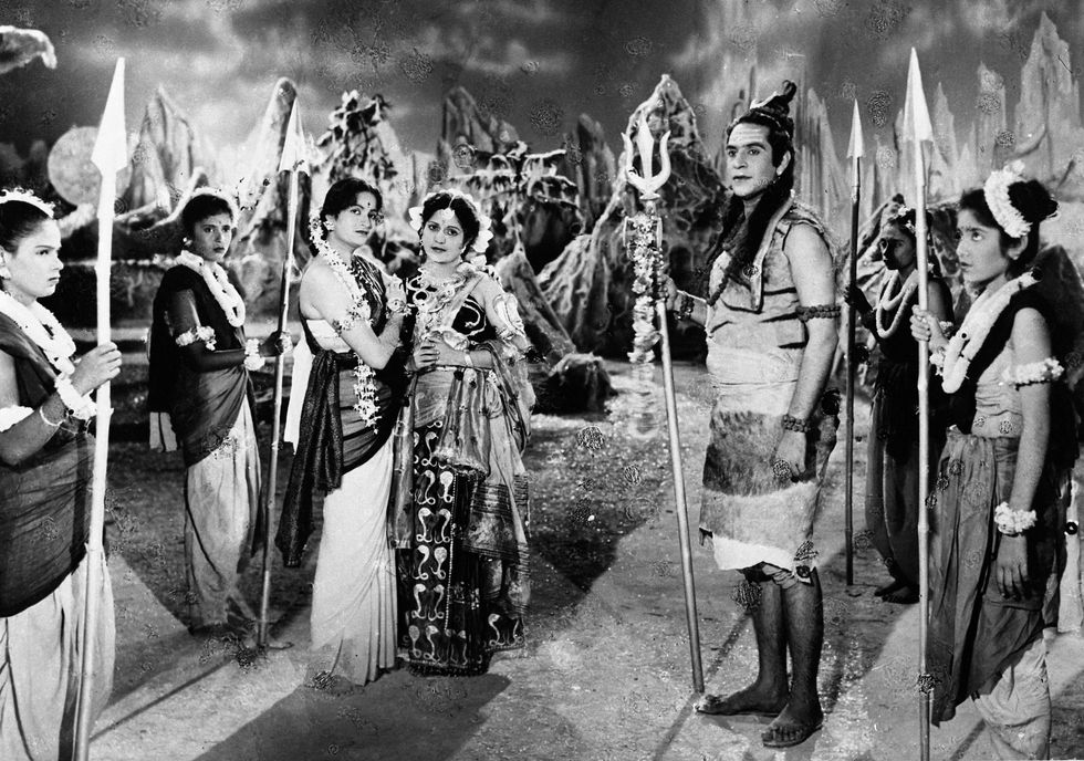 a black and white photo of a group of people