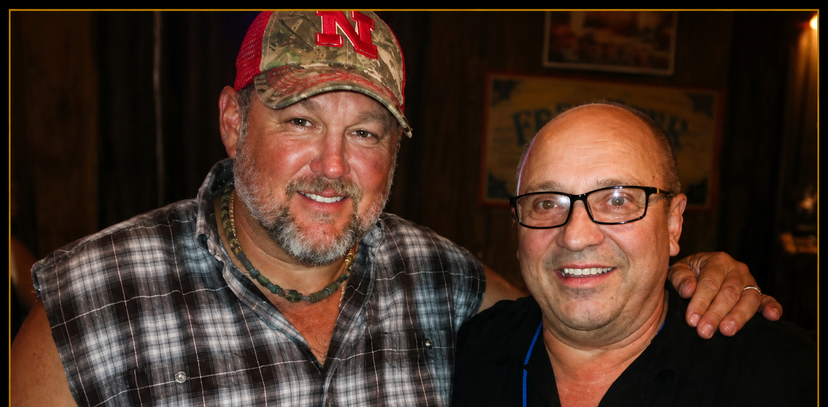 Larry the Cable Guy and comedian Keith Lenart together backstage.