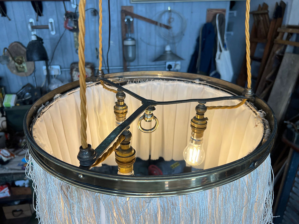 Edwardian fringe rise and fall ceiling light