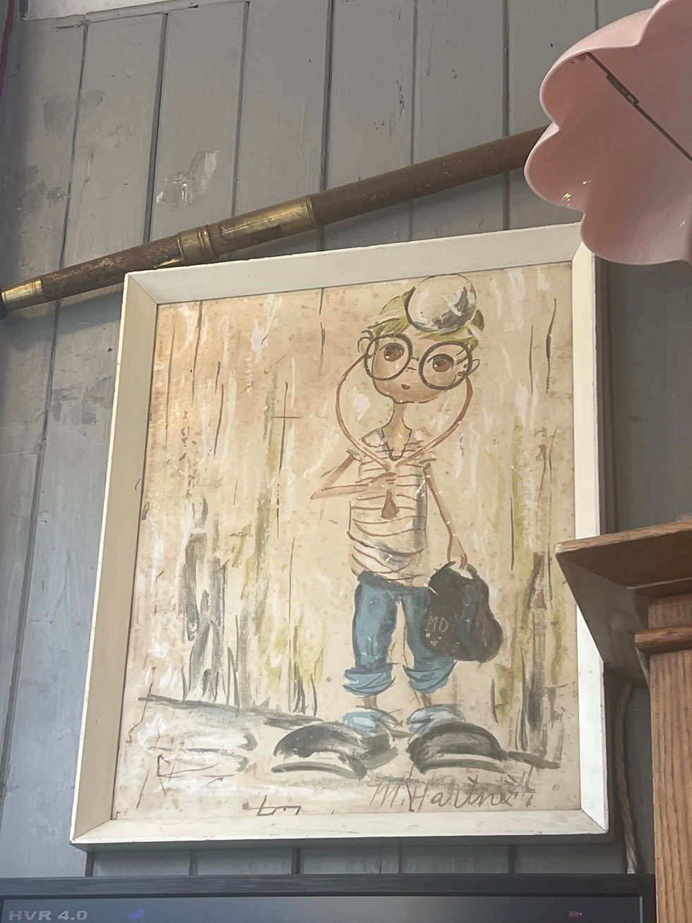 Image of a framed picture with a boy doctor