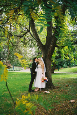 Couple share a moment under a tree
