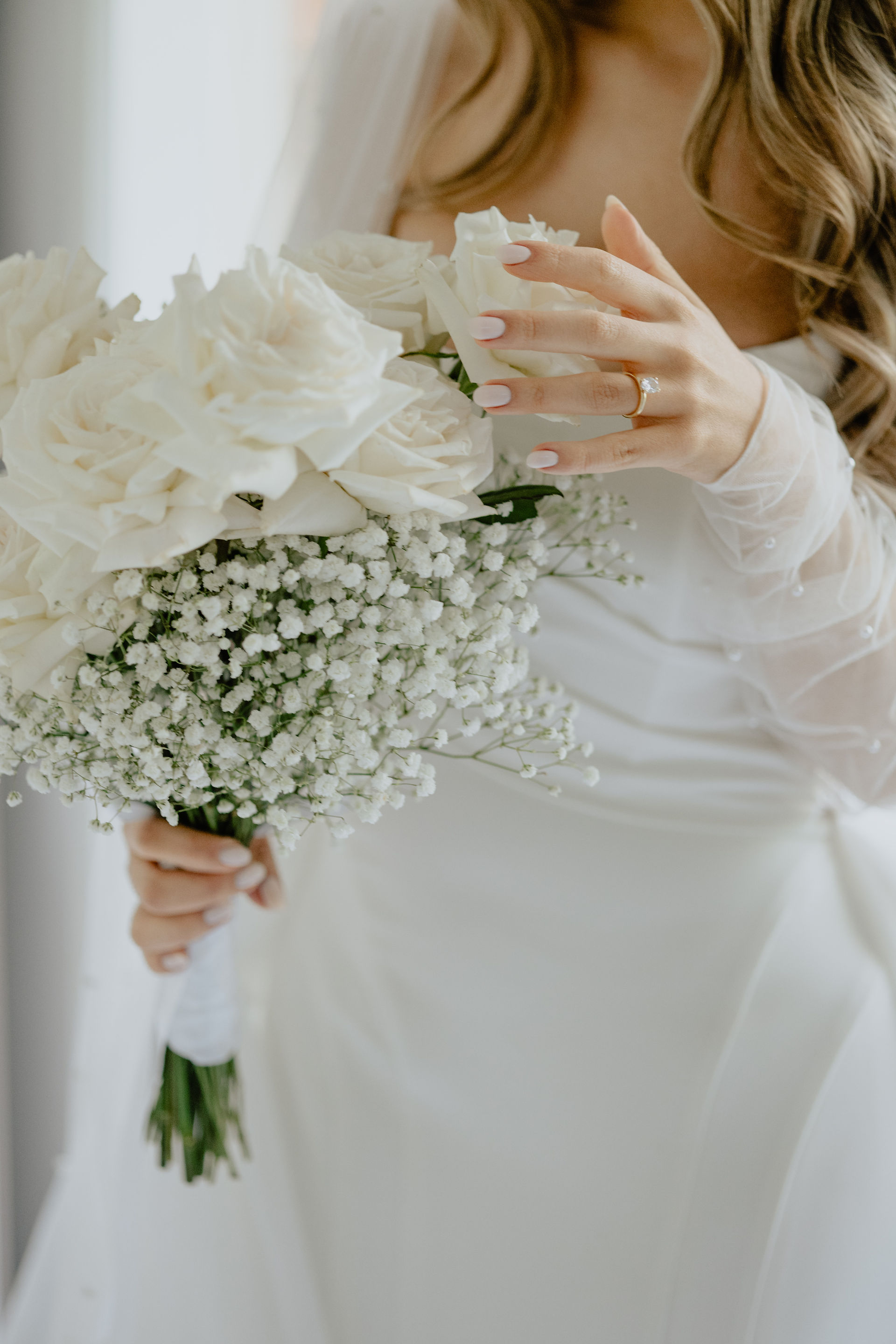 Bride checking out her bouquet