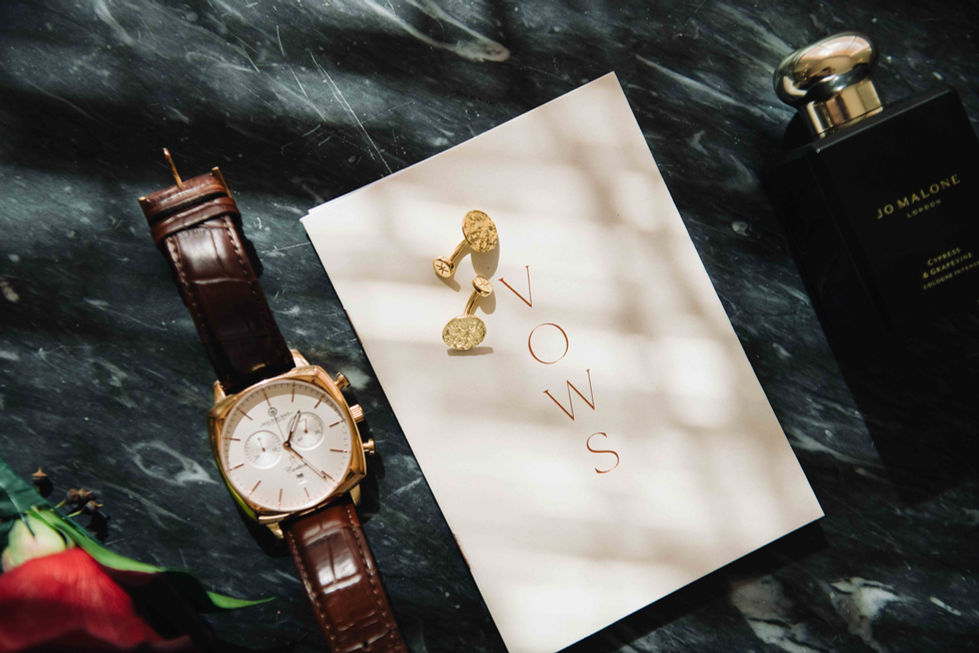 a watch sits next to a card that says wows