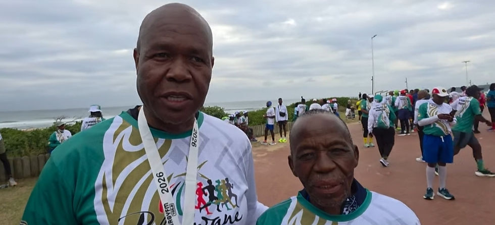 Tate Mosehla Makes Every Step Count: Executive Mayor Cllr Makoro John Mpe with the 84 year-old Johannes Karos Mosehla who broke his own record as the oldest Comrade Marahon runner.