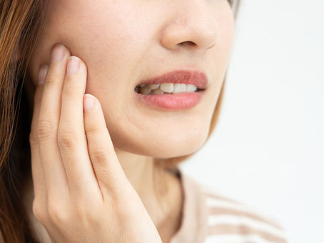 What Causes Tooth Sensitivity? Seattle Dentist Breaks It Down