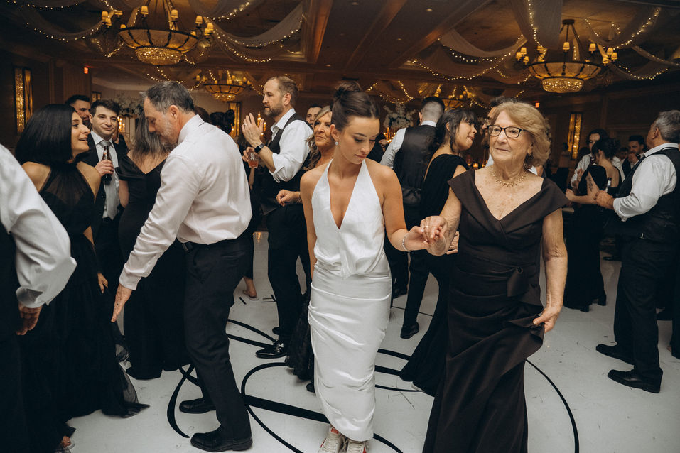 Jessica dancing with woman at Chicago engagement party