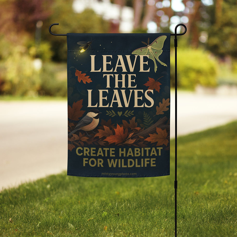 Thumbnail: Leave The Leaves garden flag on a stand in a fall yard with scattered oak and maple leaves, showing a firefly and luna moth r